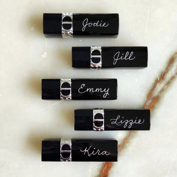 Five hand engraved Dior lipsticks with bridesmaids names in calligraphy