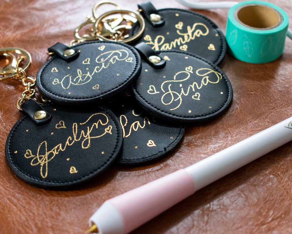 Personalized leather keychains in calligraphy