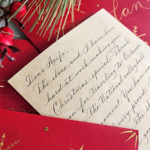 personalized Letter from Santa with calligraphy on parchment and decorated red envelope